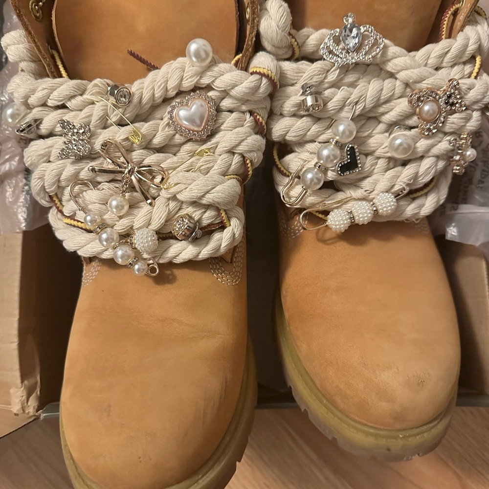 Embellished Timberland Boots with rope shoelaces and charms women's size 11